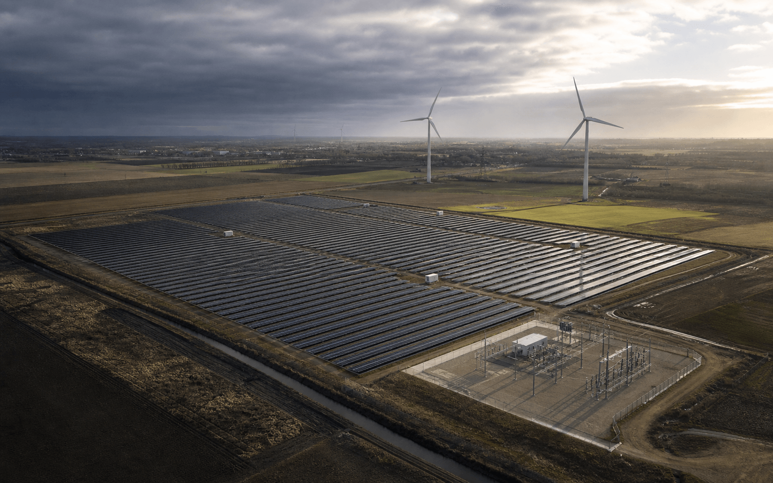 Illustrative Photovoltaik- und Windenergielandschaft mit Umspannwerk